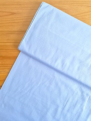 Tela sarga color celeste bebé vista desde arriba