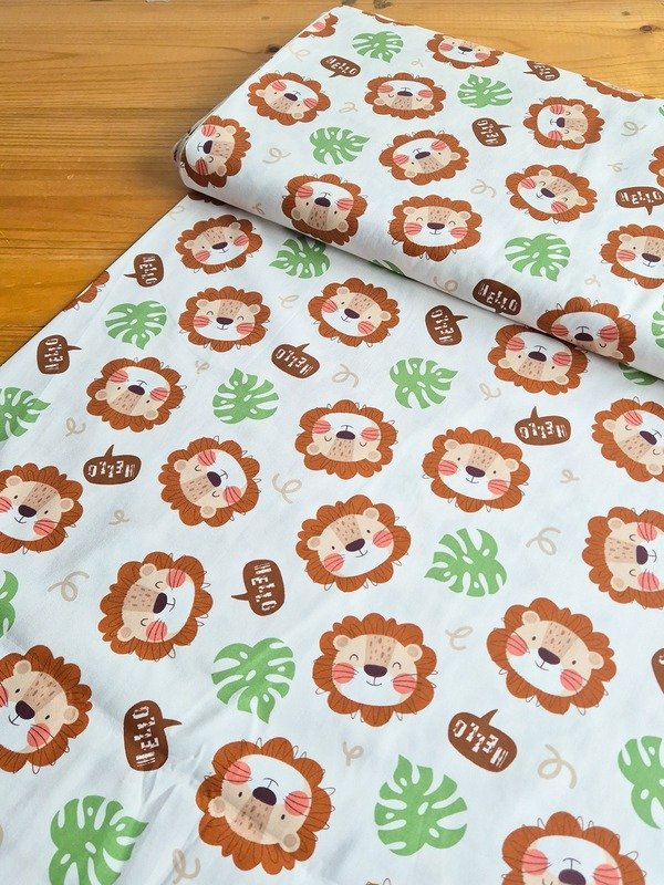 Tela Sarga Caras de Leones y Hojas Verdes