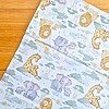 Tela sarga (tela crea), tela de algodón con estampado infantil de leones, elefantes y jirafas bebés para confección, decoración y manualidades en Chile