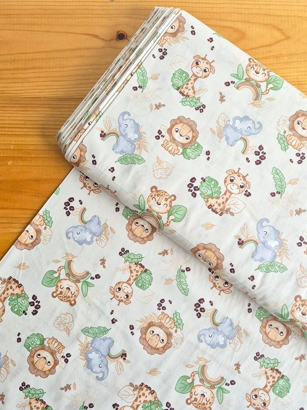 Tela sarga (tela crea), tela de algodón con estampado infantil de elefantes, leones, jirafas y arcoíris para confección, ropa infantil y manualidades en Chile